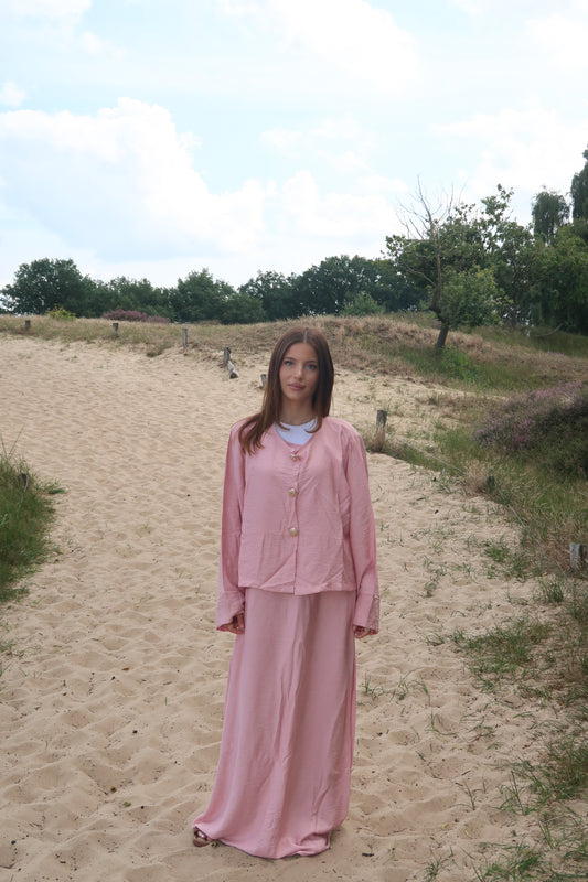 pink two-piece with white blouse