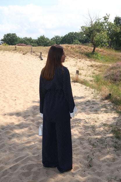 Two-piece suit in dark blue with pinstripes